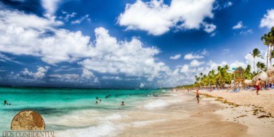 Beach in Dominican Republic with expats standing on the shore