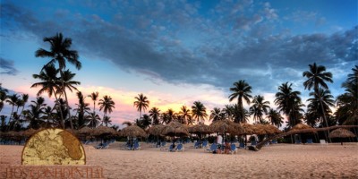 The sun sets over the Dominican Republic while walking on the beach in Bavaro, near Punta Cana.
