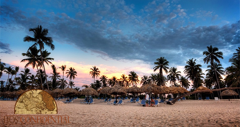 The sun sets over the Dominican Republic while walking on the beach in Bavaro, near Punta Cana.