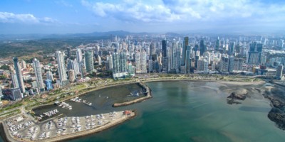 Panama Bahia Ariel View of Panama City And The Bay With Impressive High Rise Buildings In The Foreground And Mountains In The Distance