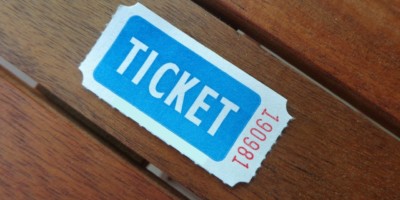 old style ticket on a wooden table