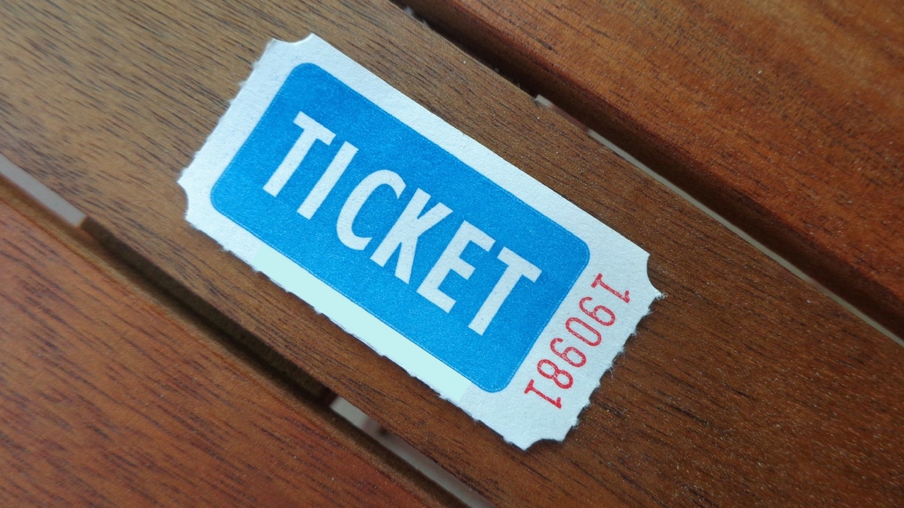 old style ticket on a wooden table