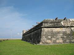 battlements with stone wall and cannons at cartagenas walled city