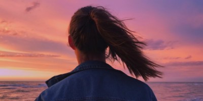 Woman overlooking the ocean