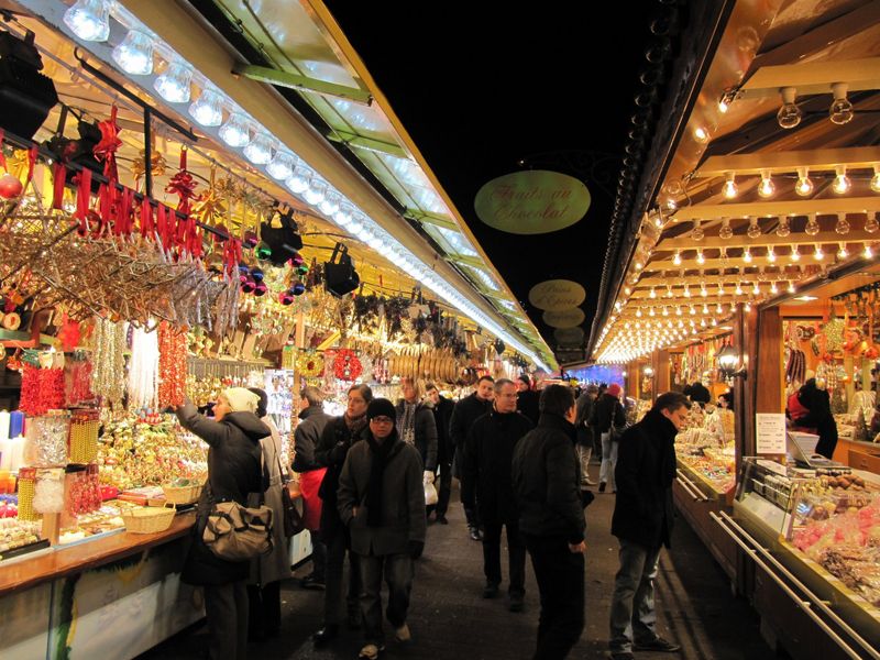 shoppers enjoying the christmas market in france