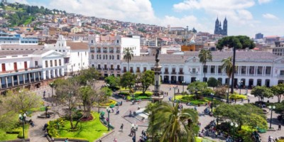 plaza grande ecuador view across the square and people walking around it