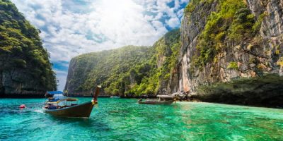 Beautiful landscape with traditional boat on the sea in Phi Phi Lee region of Losama Bay in Thailand
