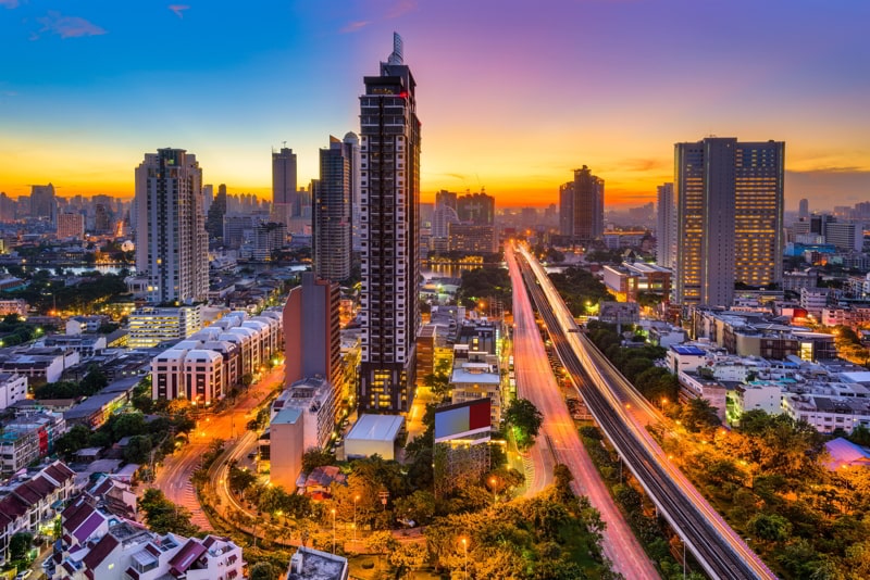 Bangkok, Thailand skyline from Krung Thon Buri on a beautiful sunrise.