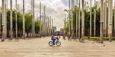 parc de las luces medellin person on a bike