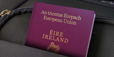 irish passport in a backpack