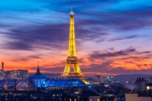 Shimmering Eiffel Tower at sunset in Paris, France.