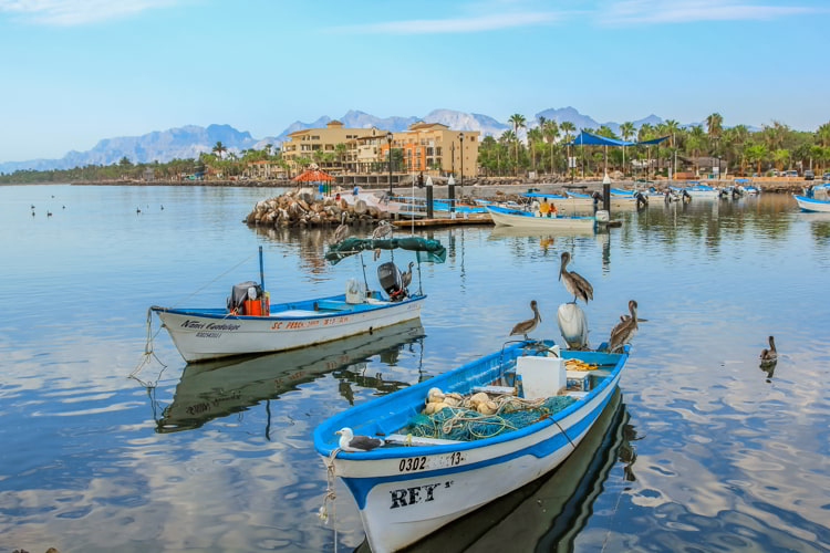 Boats are docked at the port of Loreto, Mexico