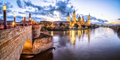 Sunset in Zaragoza, Spain with basilica of El Pilar