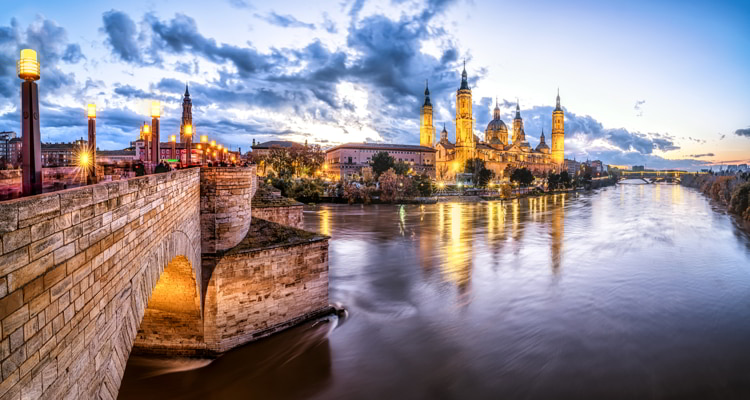 Sunset in Zaragoza, Spain with basilica of El Pilar