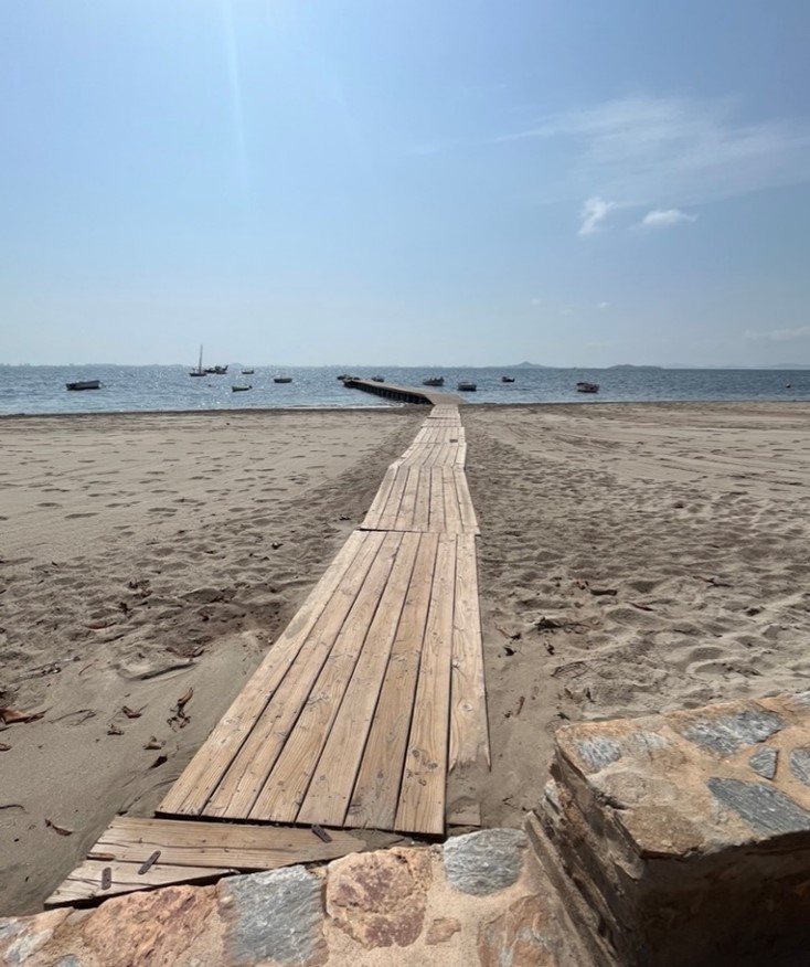 An accessibility pier across the sand and over the water at Los Alcazares