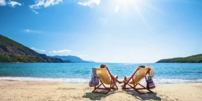 Happy couple relaxing on the beach