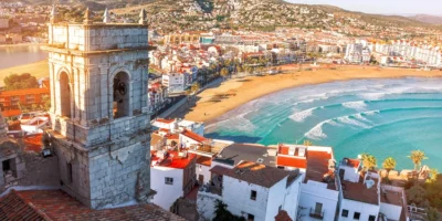 Beach and old buildings in Valencia Spain